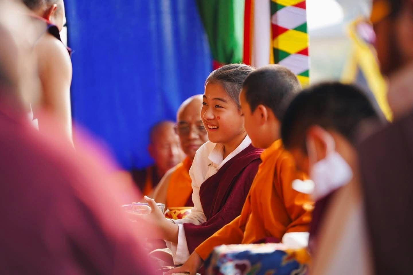 Community members smiling together at a gathering